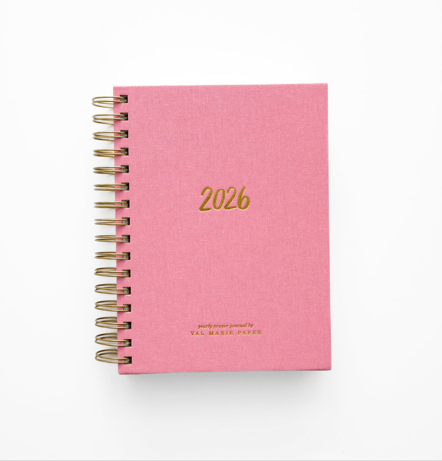 Pink prayer journal with gold spiral and 2026 on the front.